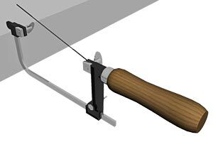 Placing saw blade into frame